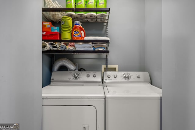 washroom with separate washer and dryer