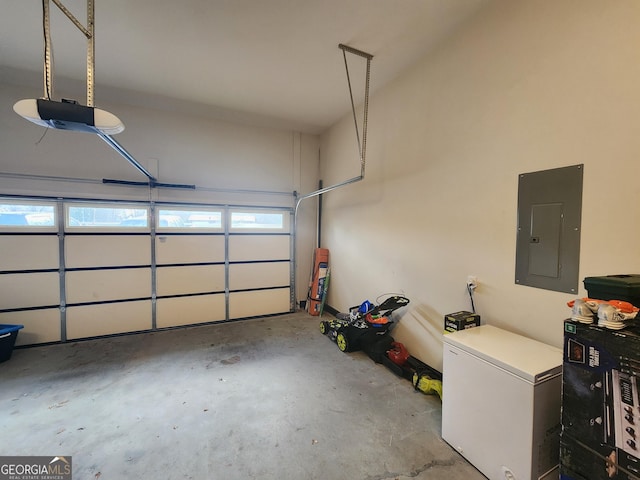 garage featuring a garage door opener, refrigerator, and electric panel