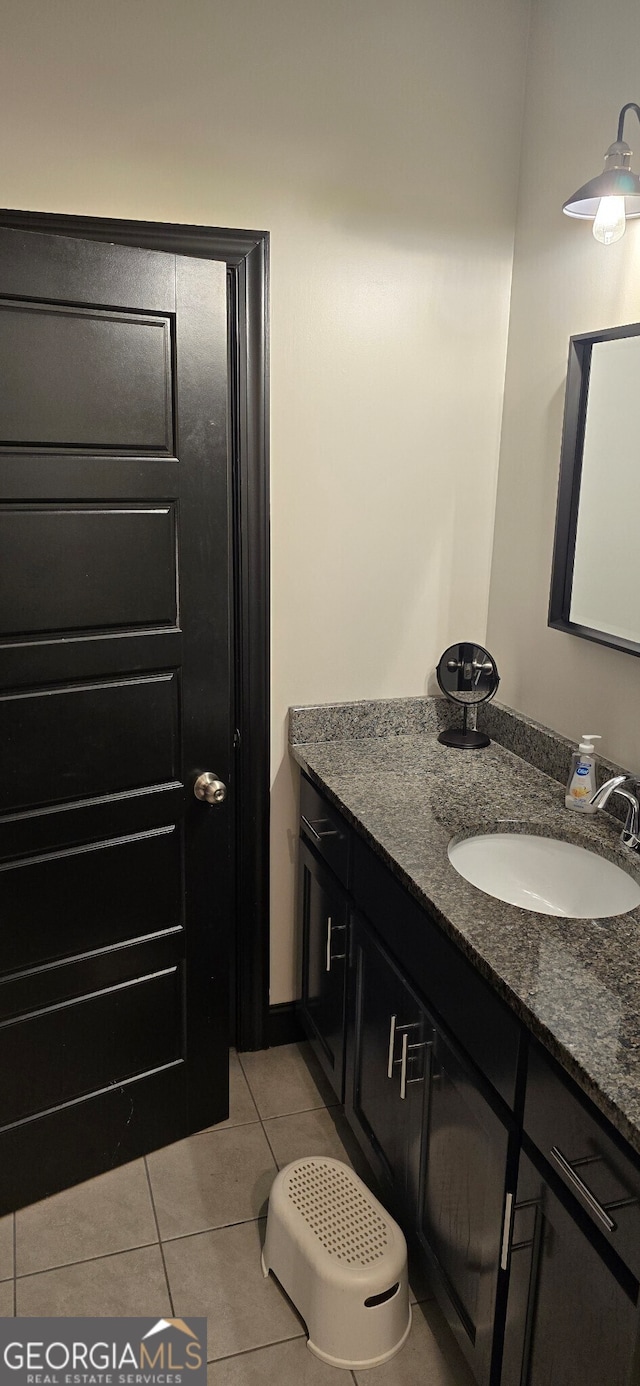 bathroom featuring vanity and tile patterned floors