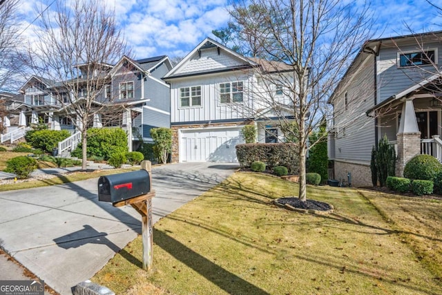 view of front of home featuring a front yard and a garage