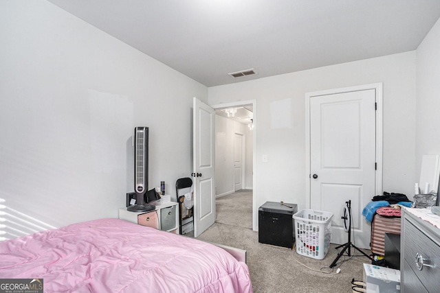 bedroom with light carpet