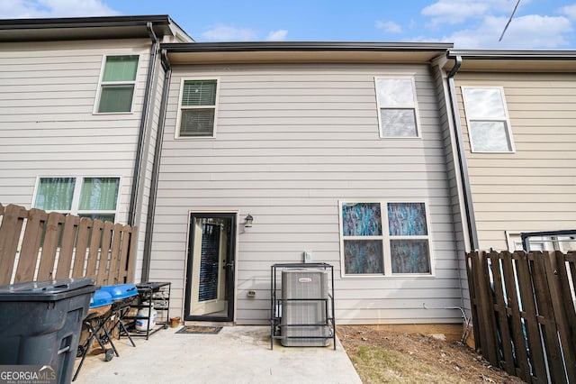 rear view of property featuring a patio