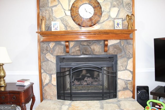 interior details featuring a fireplace