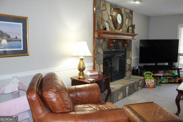 living room featuring carpet and a fireplace