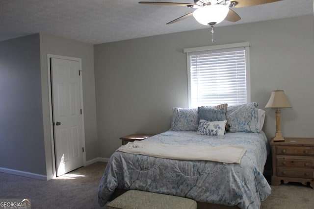 bedroom featuring ceiling fan and carpet flooring