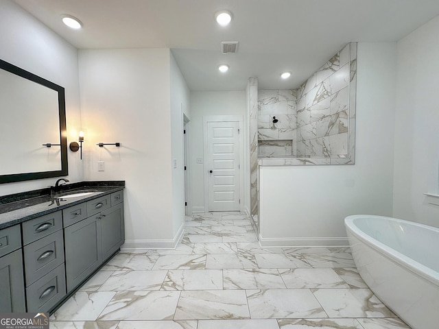 bathroom featuring vanity and separate shower and tub