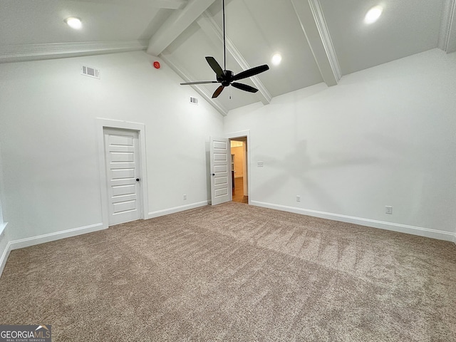 unfurnished bedroom with high vaulted ceiling, carpet floors, ceiling fan, and beam ceiling