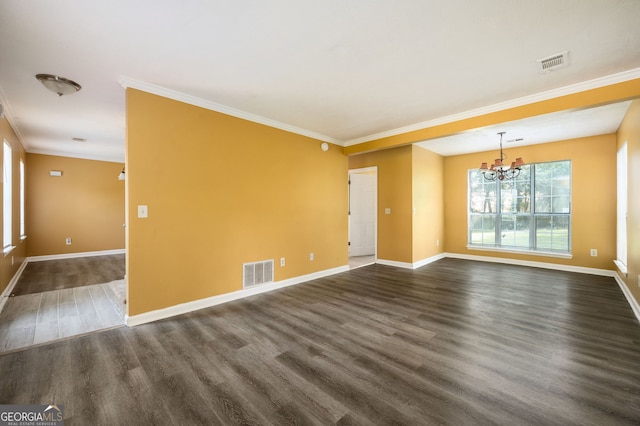 unfurnished room featuring a chandelier, ornamental molding, and dark hardwood / wood-style floors