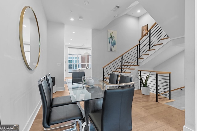 dining area featuring light wood-type flooring