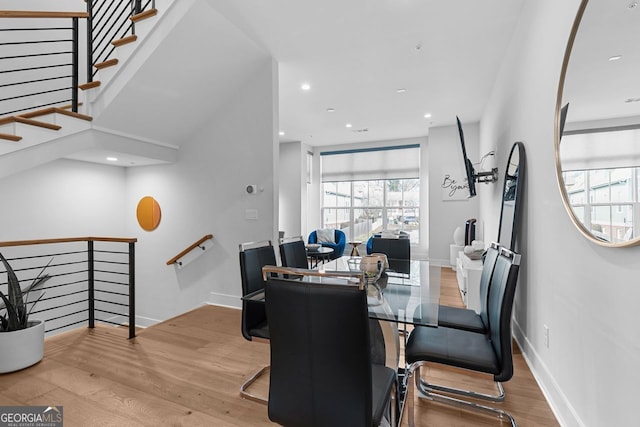 dining room with light hardwood / wood-style flooring