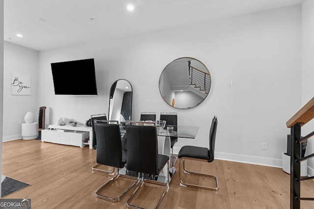 dining area with light wood-type flooring