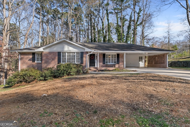 ranch-style house with a carport