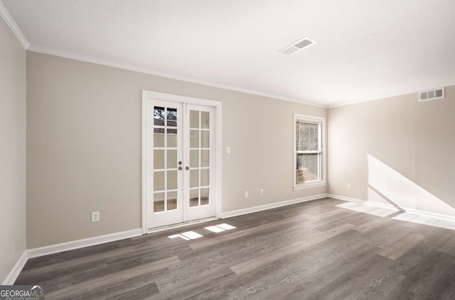 unfurnished room with dark hardwood / wood-style flooring, french doors, and crown molding