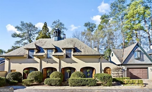 view of front of property featuring a garage