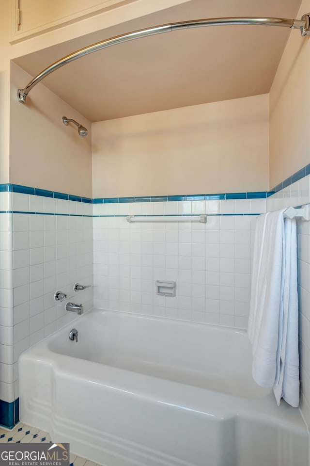 bathroom with tile patterned floors