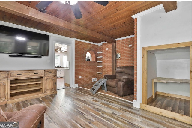 living room with beam ceiling, wooden ceiling, brick wall, and wood-type flooring