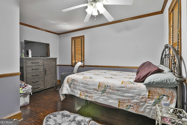 bedroom with ceiling fan, dark hardwood / wood-style flooring, and ornamental molding