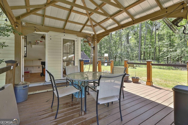 deck with a lawn and a gazebo