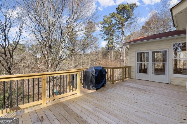 wooden terrace with grilling area