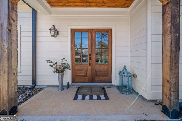 entrance to property featuring french doors