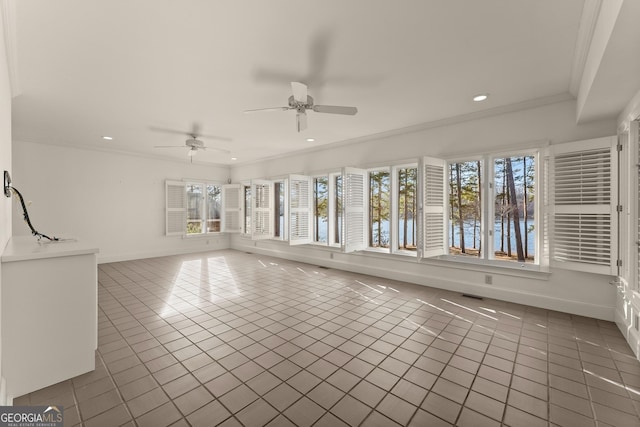 interior space with ceiling fan