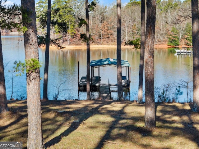 view of dock with a water view