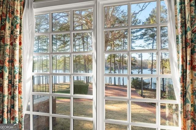 entryway featuring a water view