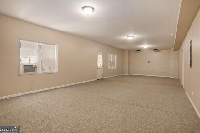 carpeted empty room with cooling unit