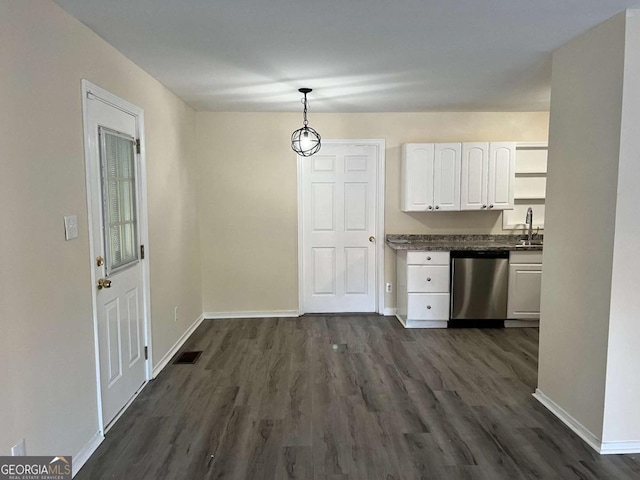 kitchen with decorative light fixtures, white cabinets, stainless steel dishwasher, and dark wood-type flooring