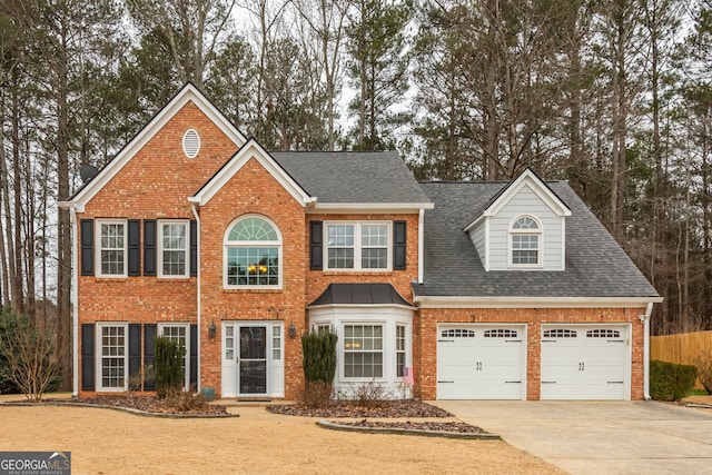 view of front of property featuring a garage