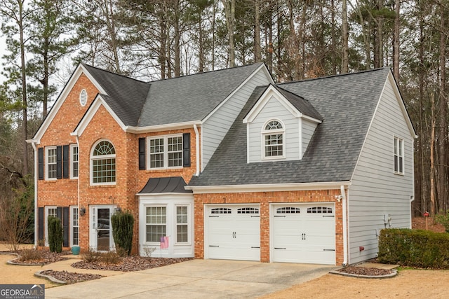 view of front of property featuring a garage