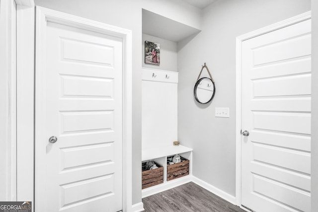 mudroom with dark hardwood / wood-style floors