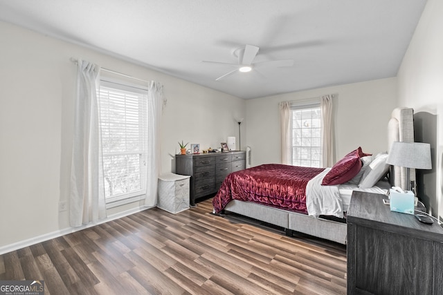 bedroom with ceiling fan and hardwood / wood-style flooring