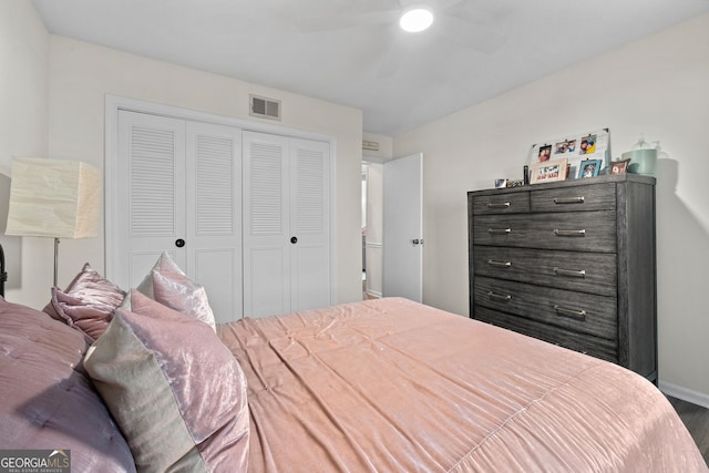 bedroom featuring a closet, ceiling fan, and hardwood / wood-style flooring