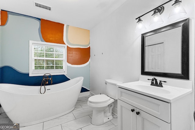 bathroom with toilet, vanity, and a tub to relax in