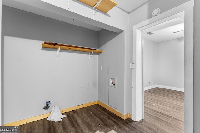 laundry area featuring hookup for a washing machine and hardwood / wood-style floors