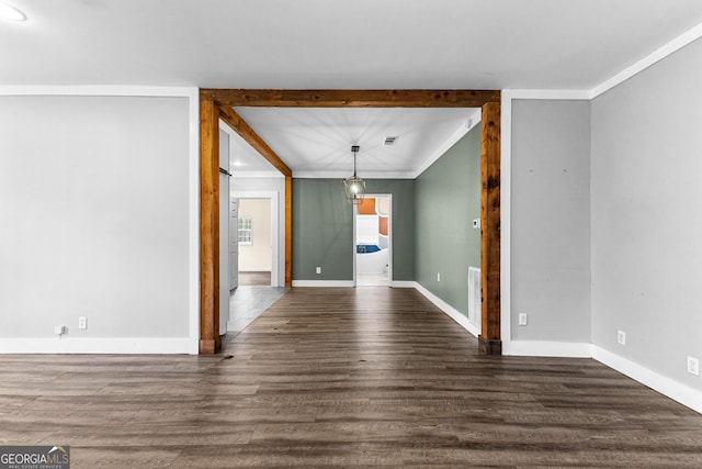 unfurnished dining area with dark hardwood / wood-style flooring and crown molding