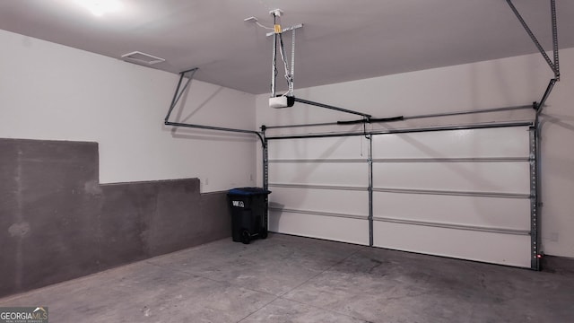 garage with a garage door opener