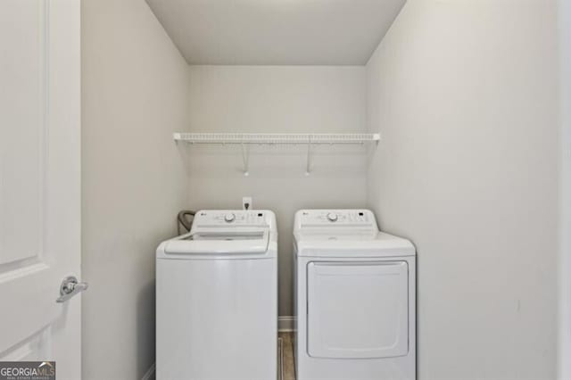 laundry area featuring independent washer and dryer