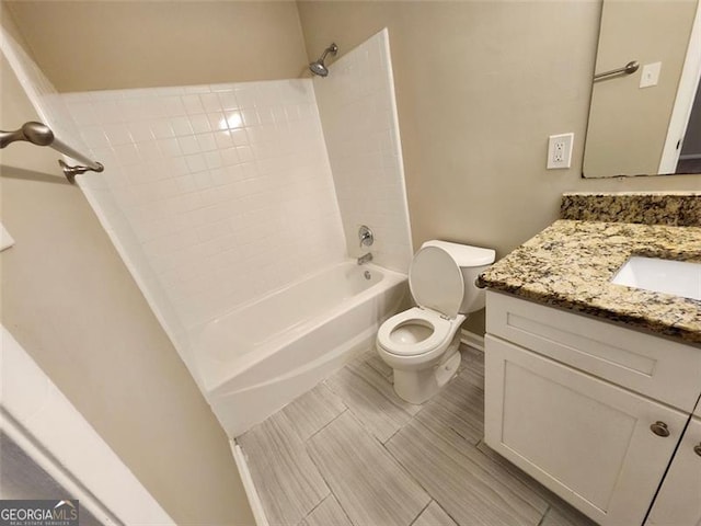 full bathroom with toilet, bathtub / shower combination, and vanity