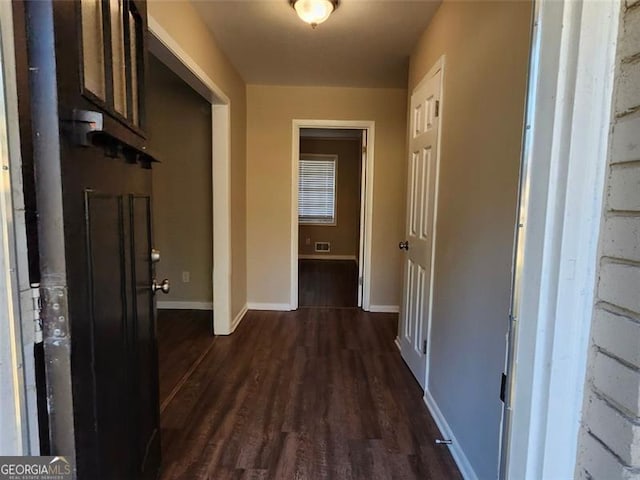 hall featuring dark hardwood / wood-style flooring