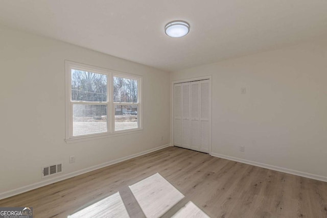 empty room featuring light hardwood / wood-style flooring