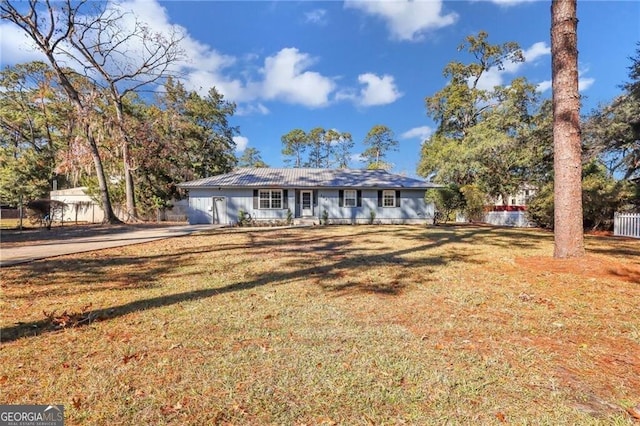 ranch-style house with a front yard