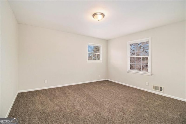 view of carpeted spare room