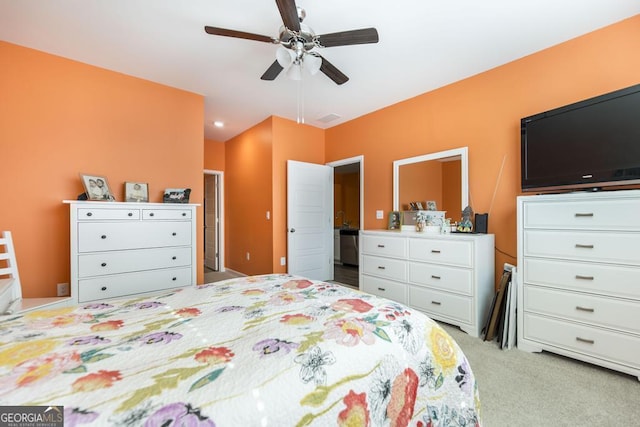 bedroom featuring ceiling fan and light colored carpet