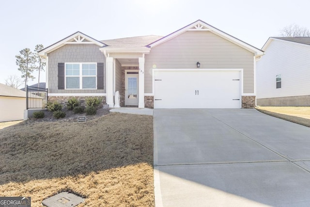 view of front of house with a front lawn and a garage