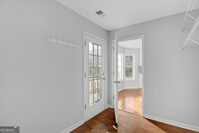 entryway featuring dark wood-type flooring