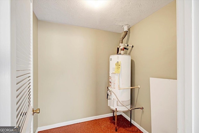 utility room featuring gas water heater