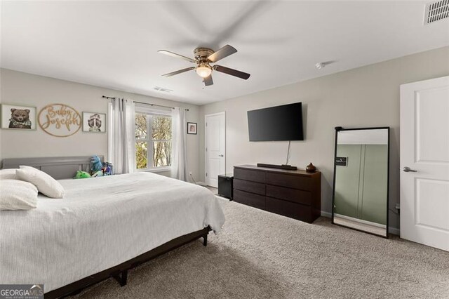 bedroom featuring ceiling fan and carpet flooring