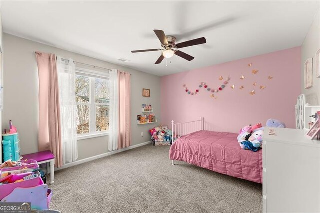 walk in closet featuring carpet flooring